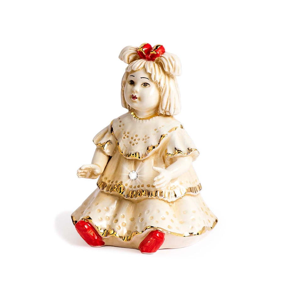 Small Capodimonte doll with bow