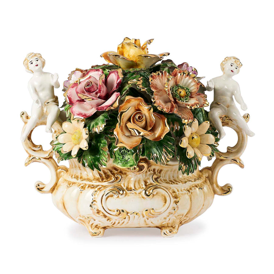 Capodimonte centerpiece with flowers and cherubs